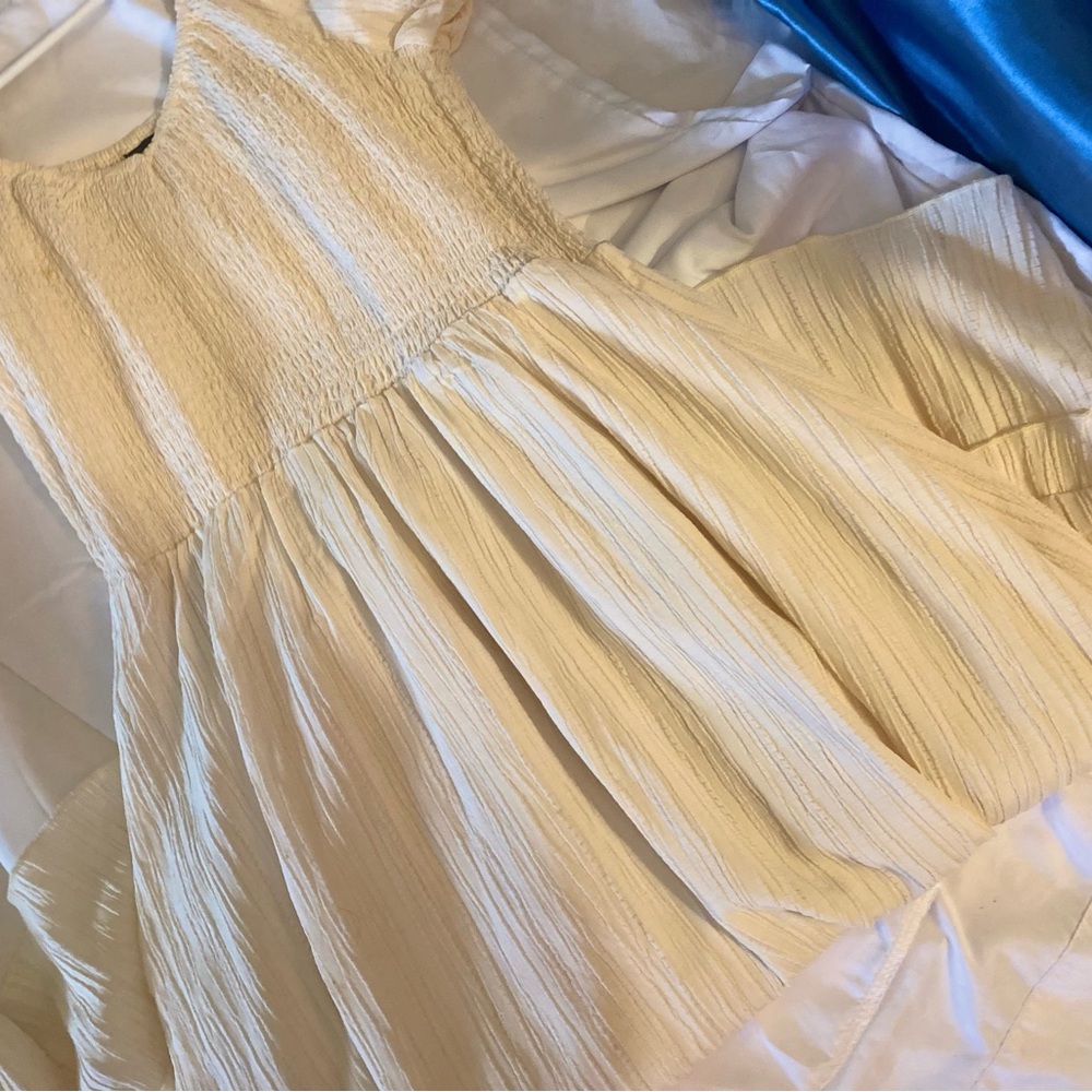 Elegant Cream Pleated Dress